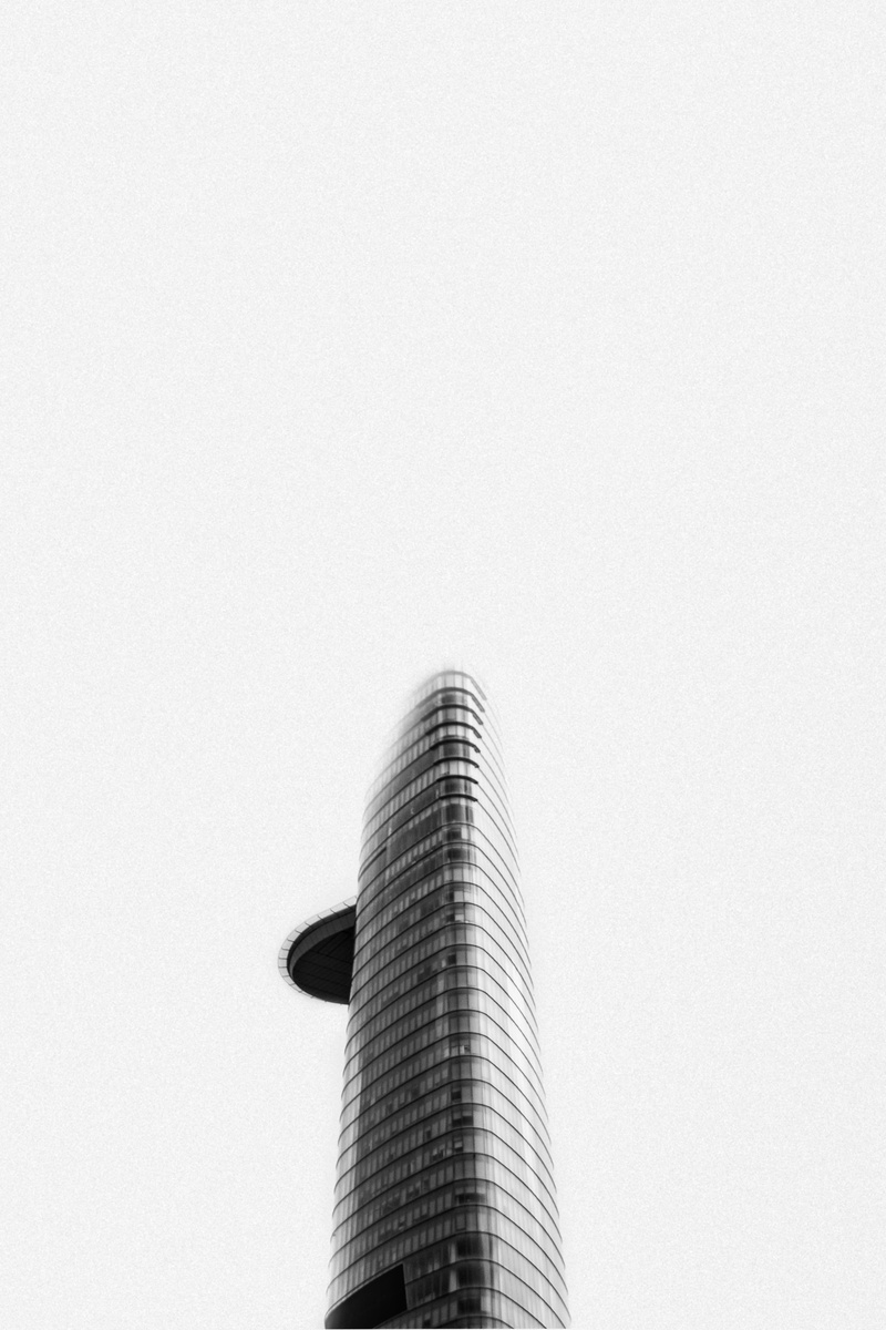 clear sky, office, black and white, city, asia, vietnam, tall - high, office building exterior, sky, tower, outdoors, saigon, architecture, no people, bitexco financial tower