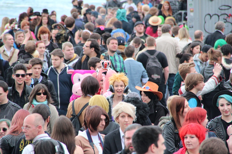 street, togetherness, adult, community, city, water, large group of people, crowded, beside, architecture, spectator, outdoors, daytime, group of people