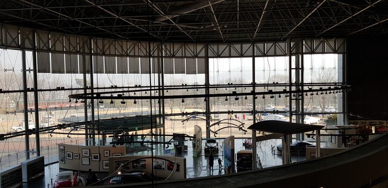 glass - material, vehicle, interior design, terminal, samsung auto museum, sunlight, train station, railing, absence, ceiling, automobile, mode of transportation