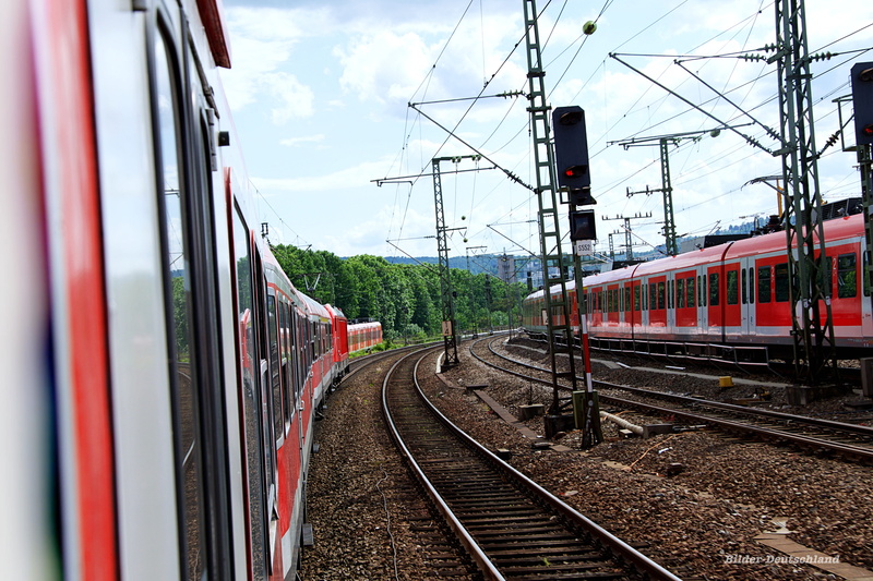 day, railway station, advertising, railroad track, movement, land vehicle, city, railway, man, red, commute, train - vehicle, no people, power supply, russia