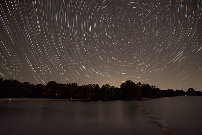 star, water, time lapse, beauty in nature, plant, astronomy, nature, night, cosmology, horizon, motion, star trails, outdoors, beside, galaxy, trees, sky