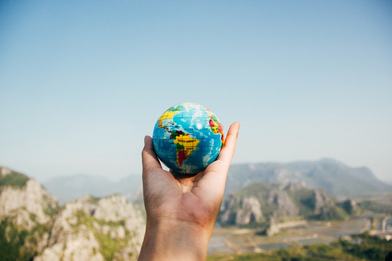 day, hand, one person, adult, globe - man made object, globes, 5K, outdoors, blue, hands, human limb, nature, sky, mountains, human arm, mountain, copy space