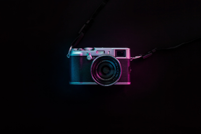 single object, digital, indoors, photography, no people, retro styled, 4K, still life, activity, simplicity, nikon, directly above, black background, communication