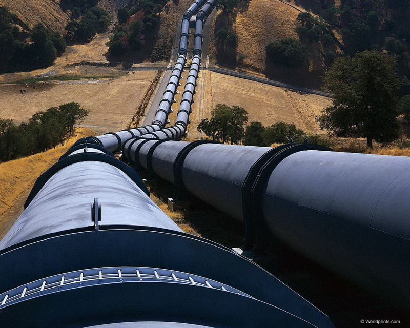 sunlight, pipeline, no people, hills, tree, transportation, mountain, connection, pipes, industry, plant, architecture, two, built structure, high angle view