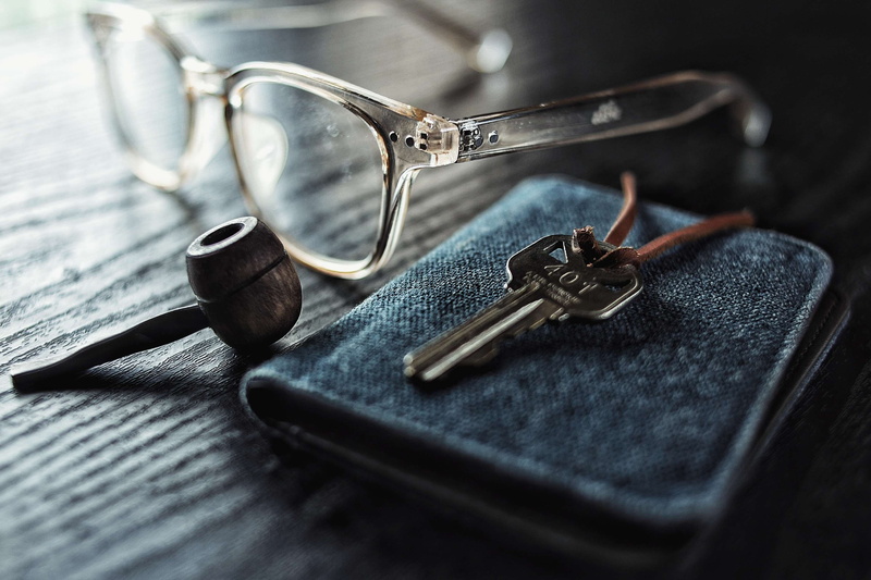 jewelry, leather, wood, pipe, smoking pipe, day, key ring, 2K, glasses, single object, metal, no people, eyeglasses, table, key, wallet, personal accessory