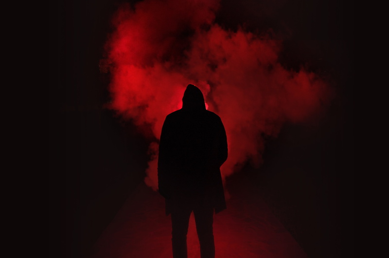 dark, hood, standing, 5K, studio shot, adult, real people, mystery, indoors, clothing, smoke, one person, hat, black, silhouette, smoke - physical structure