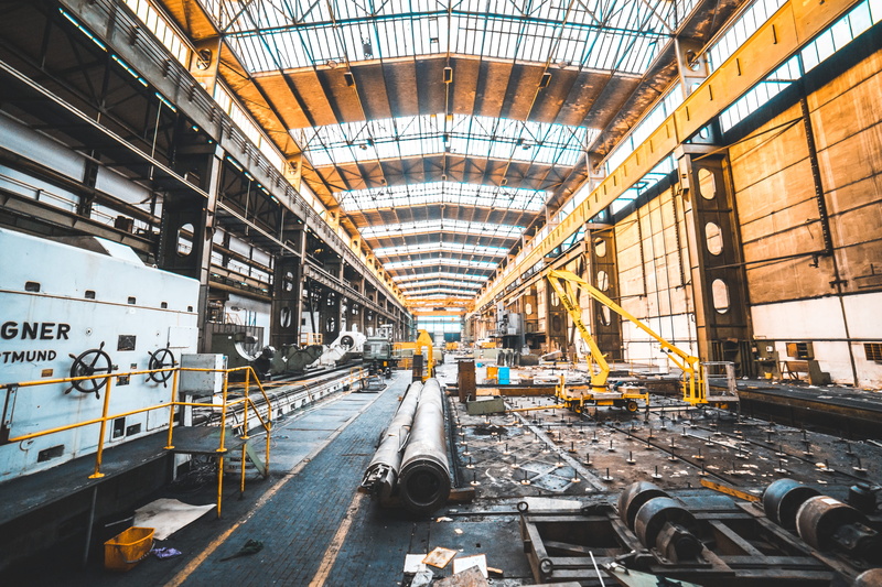 urban, generator, built structure, yellow, sunlight, in a row, near, station, architecture, place, industrial building, pipe, business, equipment, white