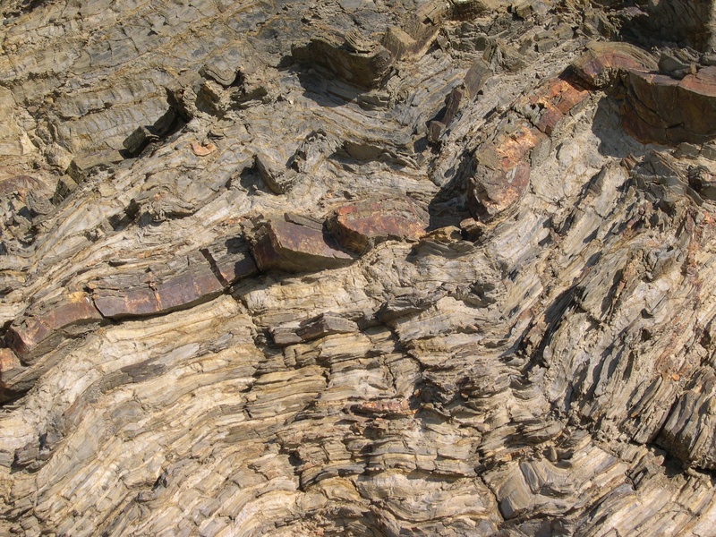 full frame, mountain, geology, no people, abstract, backgrounds, outdoors, day, eroded, rock - object, slate warp, rock formation, beauty in nature, arid climate
