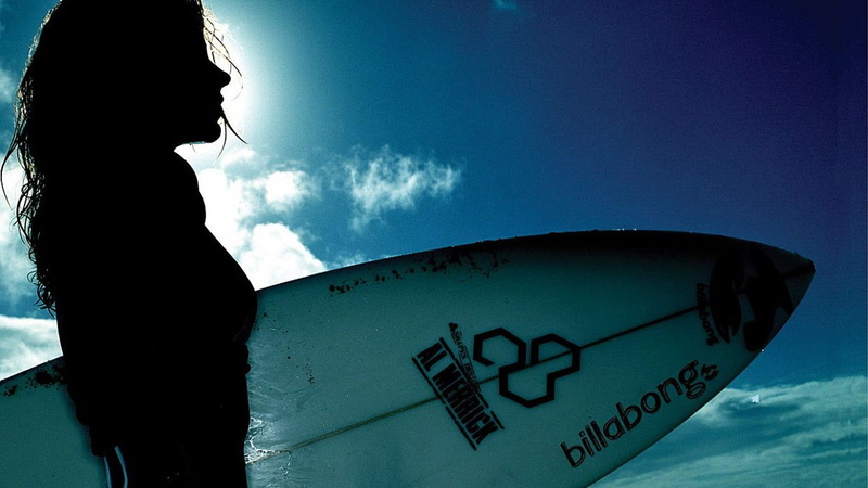 lifestyles, western script, leisure activity, cloud - sky, portrait, low angle view, outdoors, sign, blue, one person, side view, women, surfboards, text