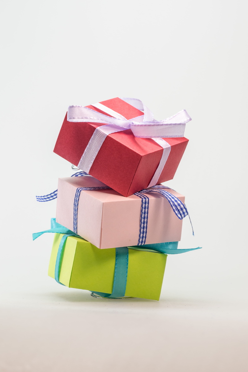 white background, package, packed, surprise, christmas, ribbon - sewing item, childrens birthday, stack, made, mothers day, assorted, gifts, still life