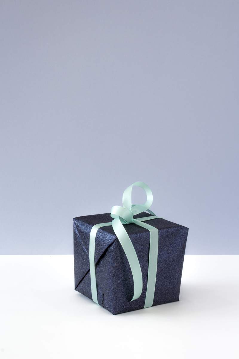 indoors, birthday present, paper, birthday, container, shape, colored background, silver colored, square, box - container, gift, surprise, packaging, turquoise colored