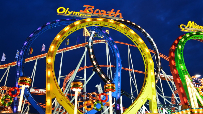 illuminated, recreation, outdoors, travel destinations, nature, built structure, low angle view, shape, amusement park ride, night, excitement, blue, lights