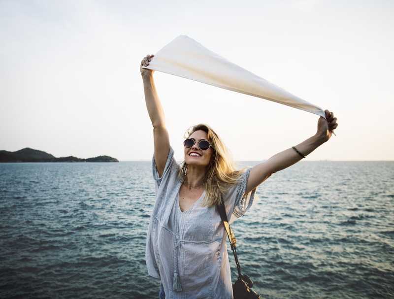 activity, lifestyles, long hair, summer, rest, dress, v, white, playful, vacation, limb, camera, fashion, leisure, peace, women, copy space, ocean, standing