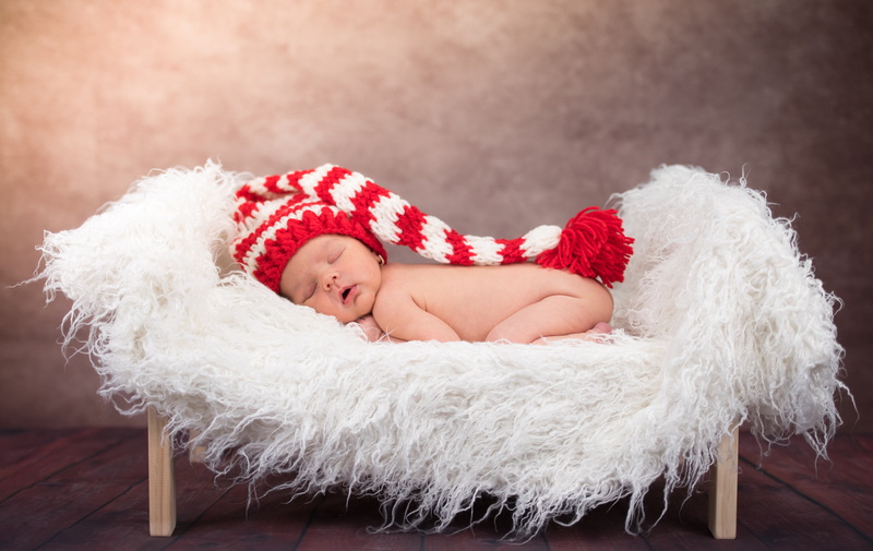 children, kid, smile, bed, children only, flooring, cute, santa hat, human body part, 5K, one person, indoors, comfortable, relaxation, infant, clothing