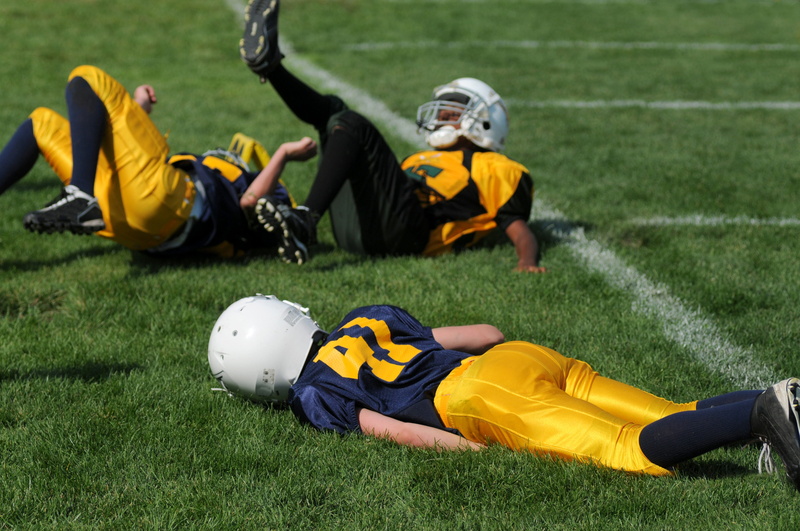 field, turf, helmet, clothing, american football - sport, lines, lying, uniform, misfortune, sports uniform, football, soccer, competition, game, ground