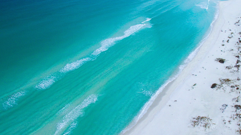 scenics - nature, motion, view, 4K, day, united states, surfing, high angle view, nature, shore, green water, aerial photography, tranquil scene, sandy