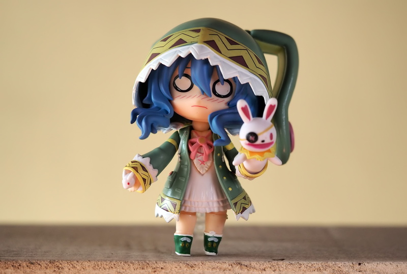 series, representation, indoors, tv, female, young, action, figurine, miku, arms raised, clothing, wall - building feature, human representation, childhood