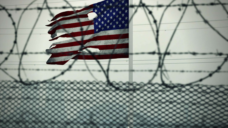 low angle view, barded wire, architecture, nature, emotion, day, usa, penitentiary, barrier, detention camp, flag, lockup, patriotism, star shape, pride
