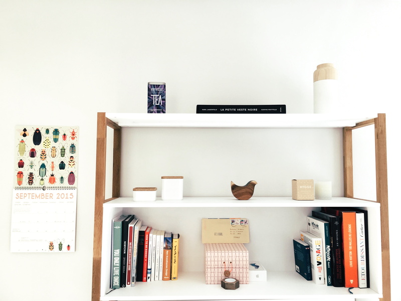 wall - building feature, variation, choice, book, wooden, large group of objects, frame, vase, shelf, neat, room, rack, minimalist, shelves, white, white color