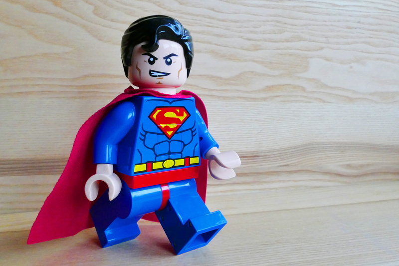 creativity, beige, hero, superman, cape, childhood, character, power, doll, super hero, fun, confidence, female likeness, representation, red, plastic