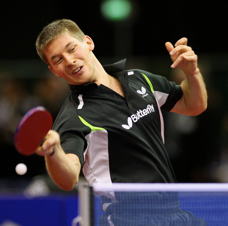 leisure activity, sport, concentration, skill, one person, men, standing, young adult, playing, adult, german, indoors, looking, arms raised, waist up