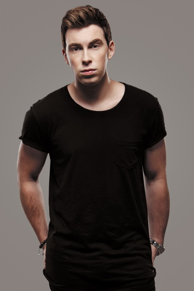 looking at camera, shirt, standing, fashion, front view, adult, s, men, serious, studio shot, DJ, indoors, gray, neck, music, one person, confidence, black
