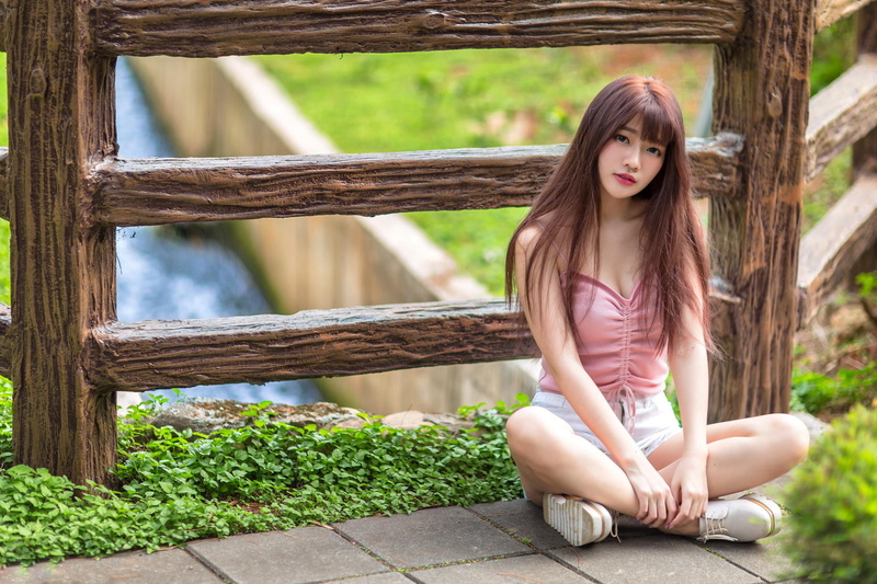 model, legs crossed, long hair, brunette, grass, sitting, shorts, women, railings, river, sneakers, 1080P, pink tops, Asian