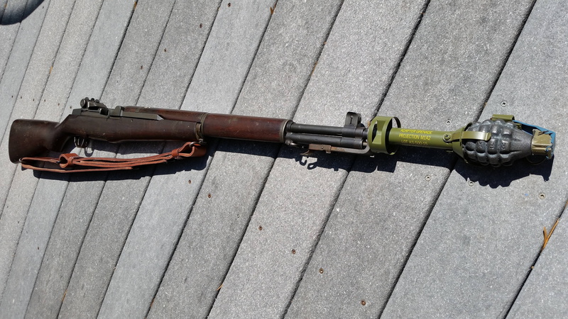 military, machine gun, wood - material, rifle, conflict, high angle view, outdoors, metal, Springfield, transportation, day, footpath, sunlight, aggression
