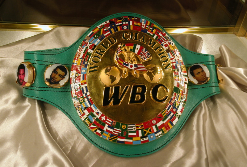 art and craft, textile, creativity, championship belt, text, gold colored, religion, male likeness, belt, cloth, furniture, no people, still life, human representation
