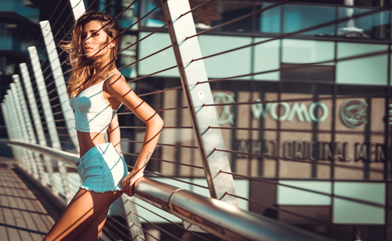 belly, blonde, women, clothing, casual clothing, jean shorts, standing, one person, focus on foreground, white clothing, leisure activity, adult, young adult