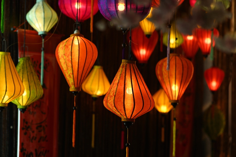 chinese lantern, large group of objects, warm, night, chinese new year, close-up, glowing, illuminated, focus on foreground, classic, electric lamp, celebration