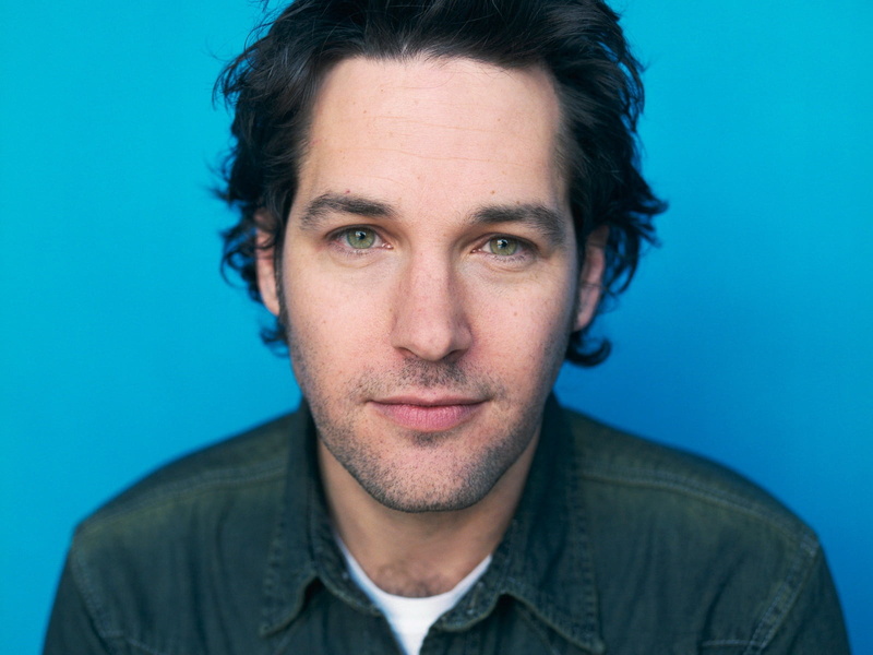 looking at camera, one person, paul, headshot, colored background, rudd, 720P, indoors, blue background, beard, young men, front view, confidence, paul rudd