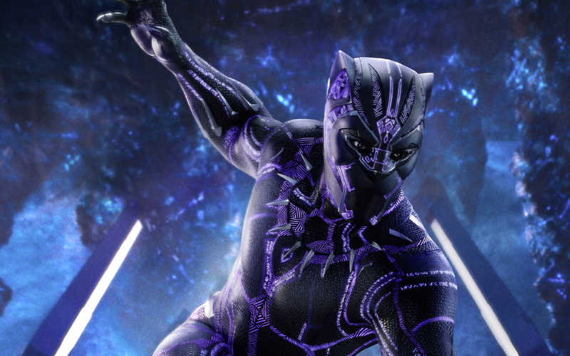 human representation, holding, close-up, night, arts culture and entertainment, blue, celebration, representation, Empire, Panther, focus on foreground