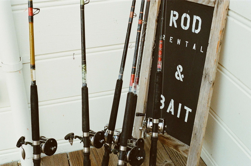 fishing, mode of transportation, rods, equipment, day, communication, architecture, outdoors, fishing line, refueling, fuel and power generation, technology