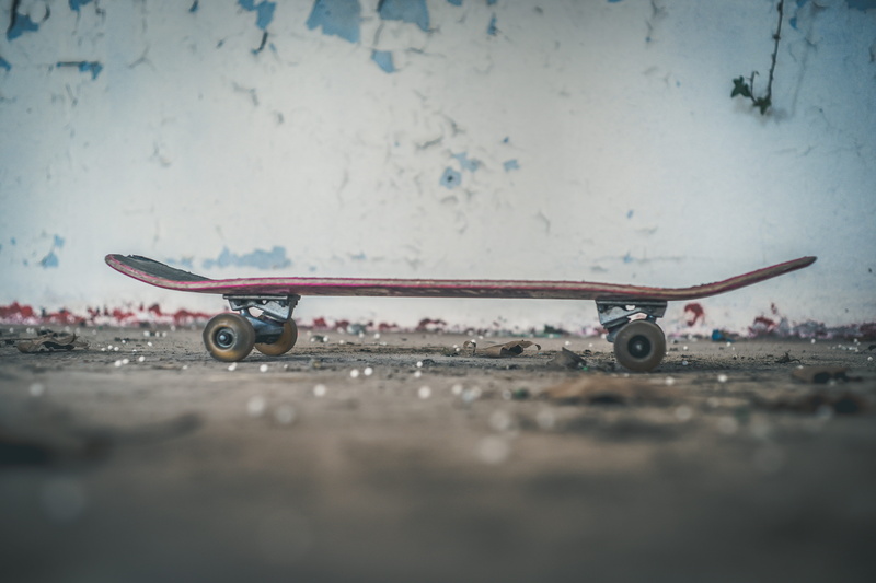 building, transportation, bumper, fishing lure, vehicle, mode of transportation, side view, car mirror, single object, wall, resort, day, wall - building feature