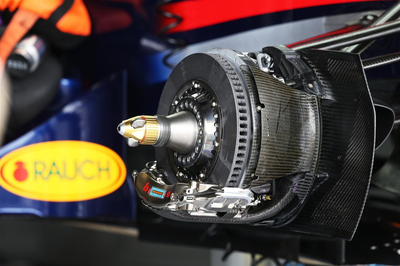 man made object, equipment, arts culture and entertainment, wheel, motor vehicle, industry, indoors, Formula 1, close-up, transportation, antique, black
