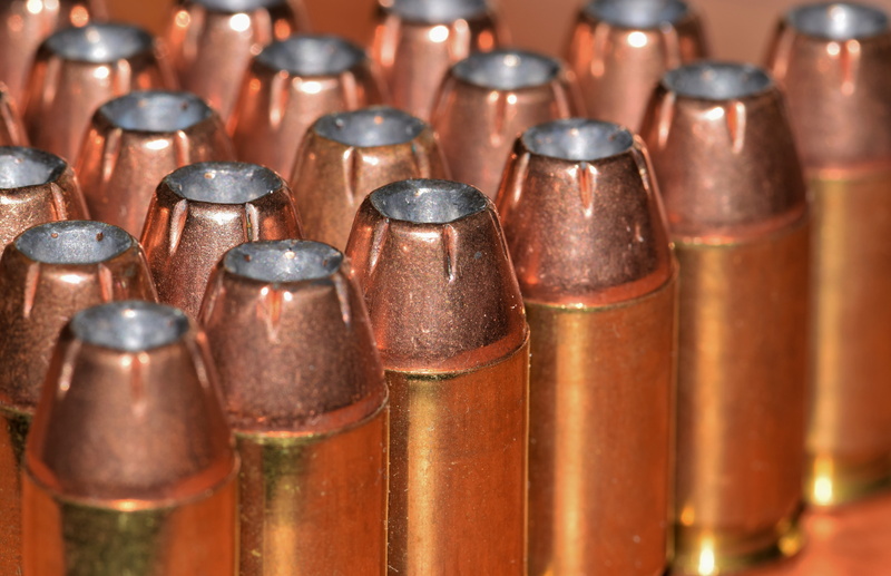 point, semi automatic, shoot, no people, bullets, in a row, order, rounds, 45, choice, large group of objects, ammo, firearms, bottle, lead, old, caliber