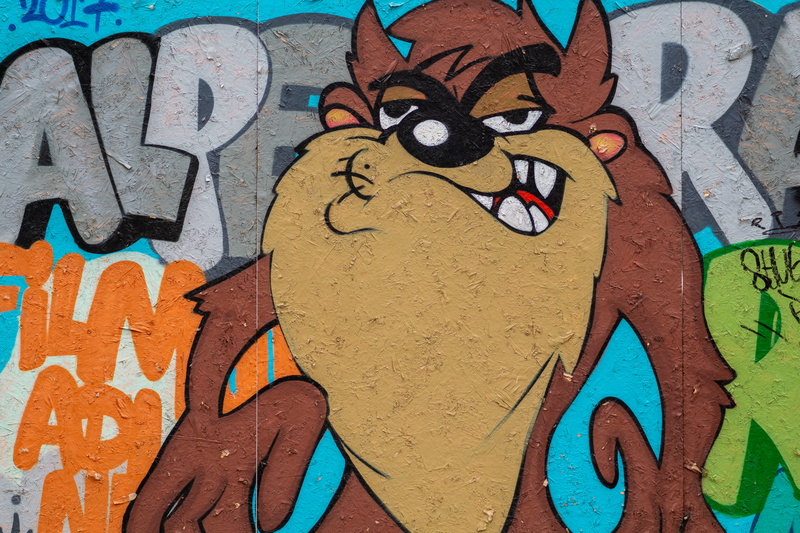 built structure, street art, human representation, day, representation, close-up, art and craft, backgrounds, mural, taz, 5K, tasmanian devil, multi colored