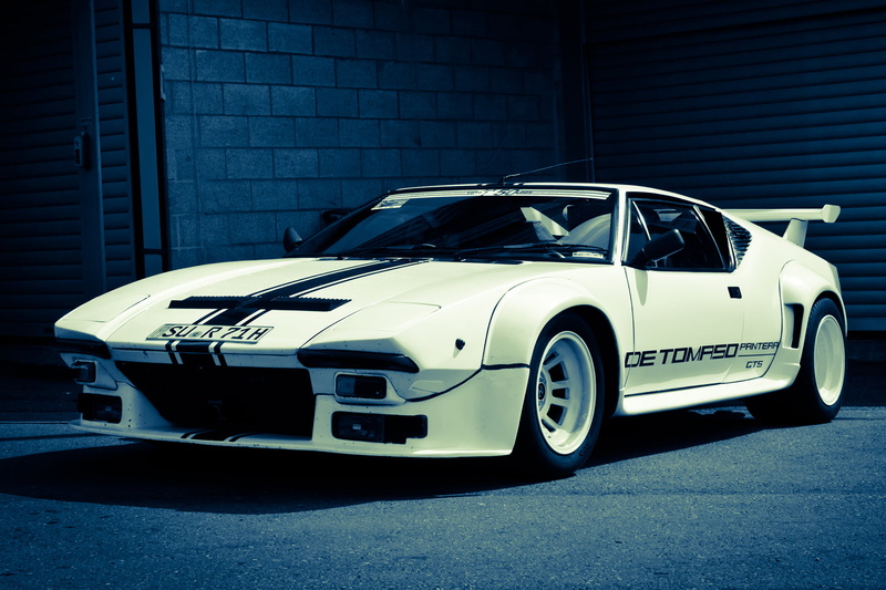 motor vehicle, city, pantera, De Tomaso, white, wall, toy, outdoors, no people, stationary, land vehicle, built structure, building exterior, street, garage