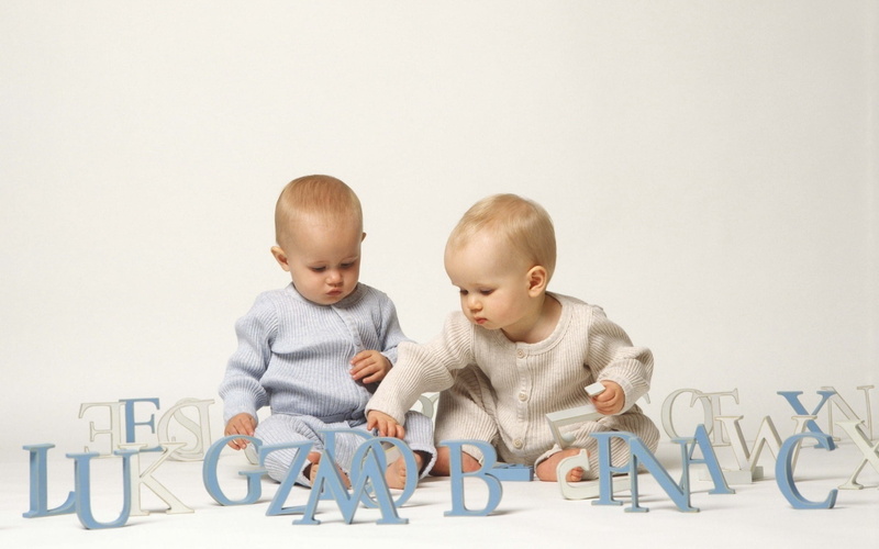 sleeper, family, cognition, men, white background, s, people, toddler, sitting, togetherness, boys, child, one Person, innocence, front view, onesie, cute
