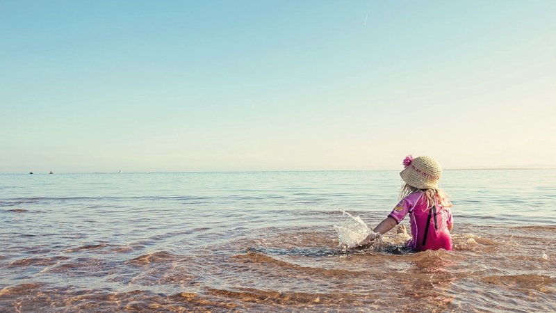 clear sky, rear view, leisure activity, nature, small, playful, one Person, hairstyle, summer, s, females, lifestyles, sea, horizon, baby Girls, coastline