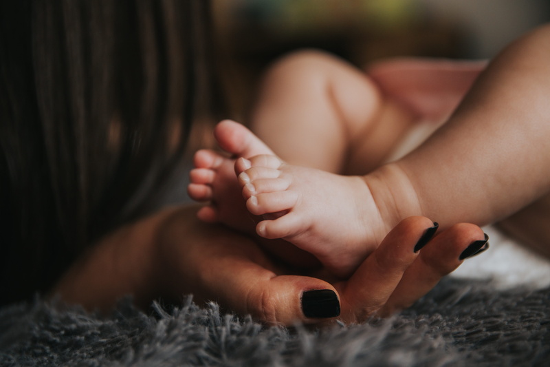 warmth, parent, relationship, comfortable, hands, kid, baby, close-up, lying down, young, feet, legs, two people, barefoot, affection, child, skin, adult
