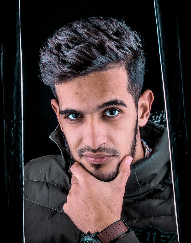 1080P, strobes, real people, eyes, mid adult men, males, stubble, tlemcen, algeria, mid adult, hairstyle, softbox, headshot, focus on foreground, close-up