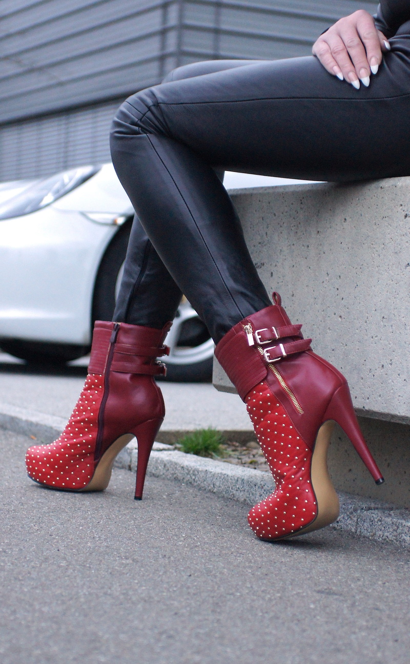 adult, technology, vehicles, real people, lifestyles, boots, human foot, human leg, human body part, red, shoe, cone, fashion, car, high heels, stiletto