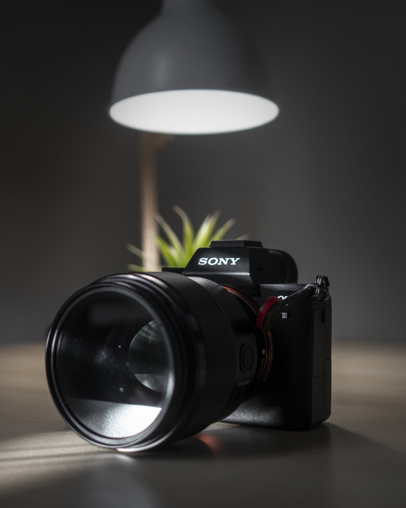 lighting equipment, retro styled, lens - optical instrument, close-up, sony, camera - photographic equipment, photographic equipment, electric lamp, slr camera