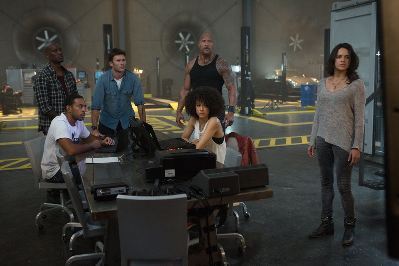 Roman Pearce, full length, sitting, people, business, women, Fast and Furious, Dwayne Johnson, Ludacris, The Fate of The Furious, coworker, Tyrese Gibson