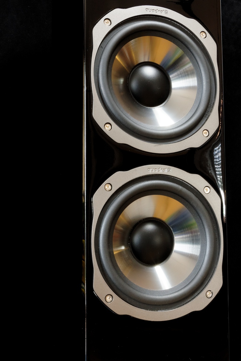 geometric shape, speaker, black background, circle, black color, quadral, no people, electrical equipment, sound, single object, audio equipment, indoors