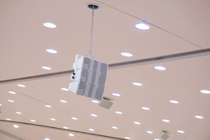 no people, white color, beschallung, speakers, box, hanging, electricity, light, cable, ceiling, lighting equipment, light fixture, sound, music, low angle view
