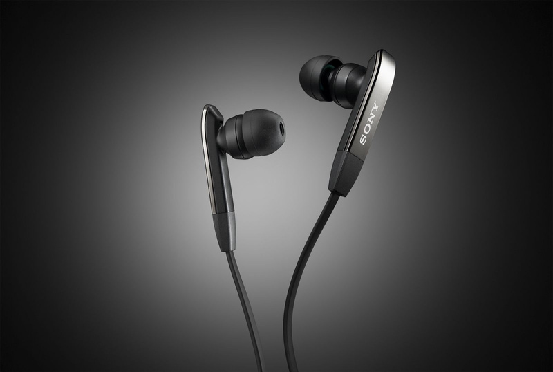 audio, indoors, Sony, technology, close-up, gray background, arts culture and entertainment, music, illuminated, earphones, cable, studio shot, copy space