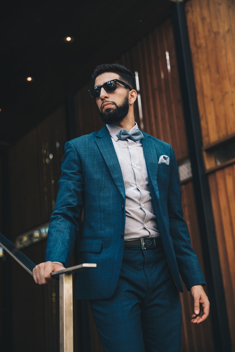 standing, photo, real people, Men, three quarter length, sunglasses, suit, leisure activity, holding, young men, lifestyles, Shopify, males, Young adult